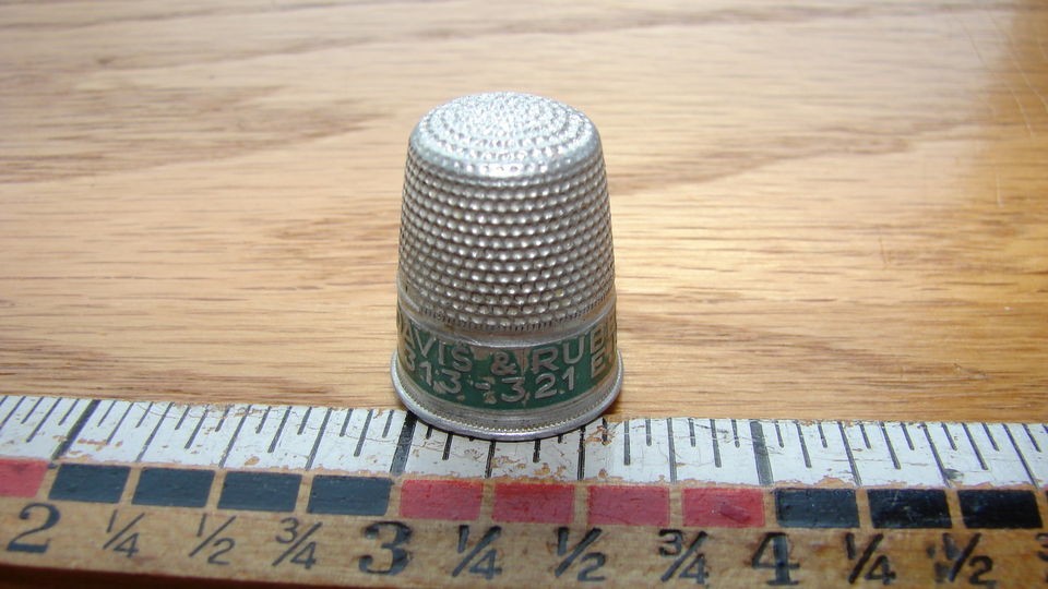 Vintage metal thimble adv. for Davis & Ruban Co. Furniture  Mpls., MN