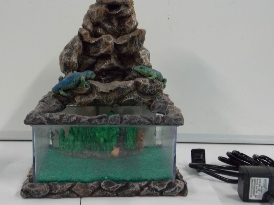 Betta aquarium with water pump   lizzard design