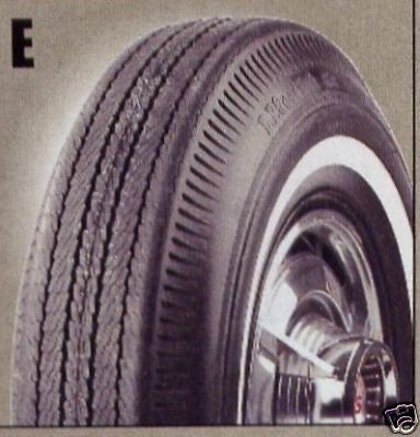 560 14 BF GOODRICH 2 1/4 INCH WHITEWALL BIAS TIRES