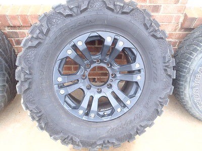 Set of 3 aftermarket rims and tires