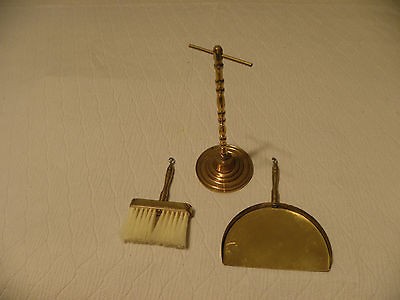 Small brass fireplace sweeper