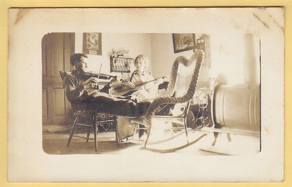 RPPC playing guitar violin wall phone stove chairs 7874