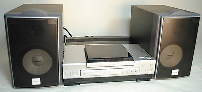   XC L5 Programmable Audio Shelf System w/ CD, Radio, Alarm  See Video