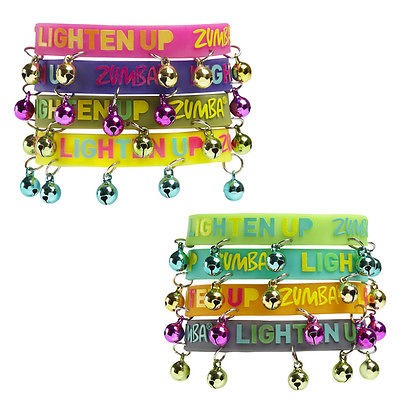 ZUMBA FITNESS Lighten Up Jingle Rubber Bracelets   Set of 8 NWT