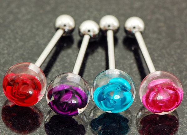   Floating titanium rose embeded in 10mm clear ball tongue rings