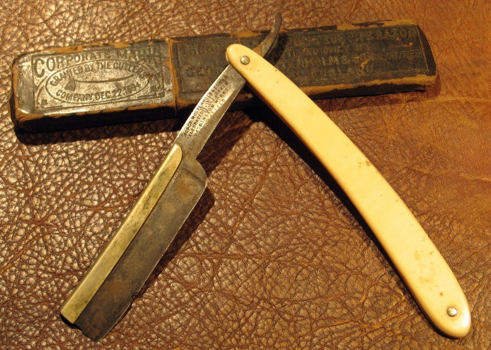 George Wostenholm & Sons Celebrated I.XL Brass Rail Straight Razor 