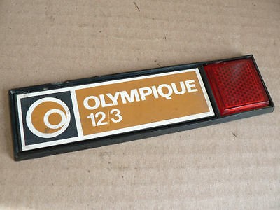   OLYMPIQUE 12/3 OLY LEFT TAG CREST VINTAGE SNOWMOBILE BOMBARDIER READ