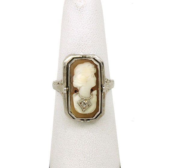 this is an antique 14k gold onyx and cameo ladies flip top