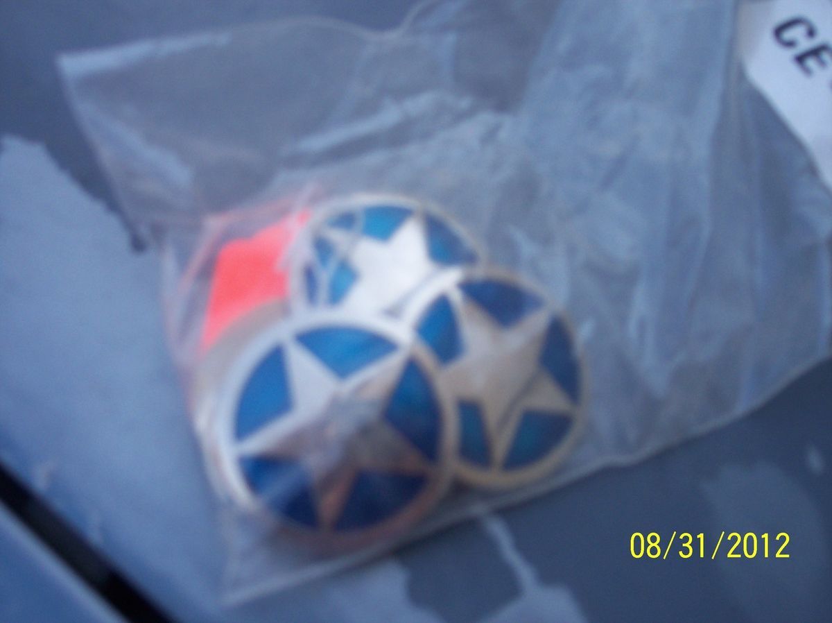 Set of four blue star conchos