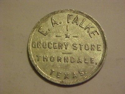 FALKE, THORNDALE, TEXAS TRADE TOKEN. GOOD FOR 25 IN MERCHANDISE 