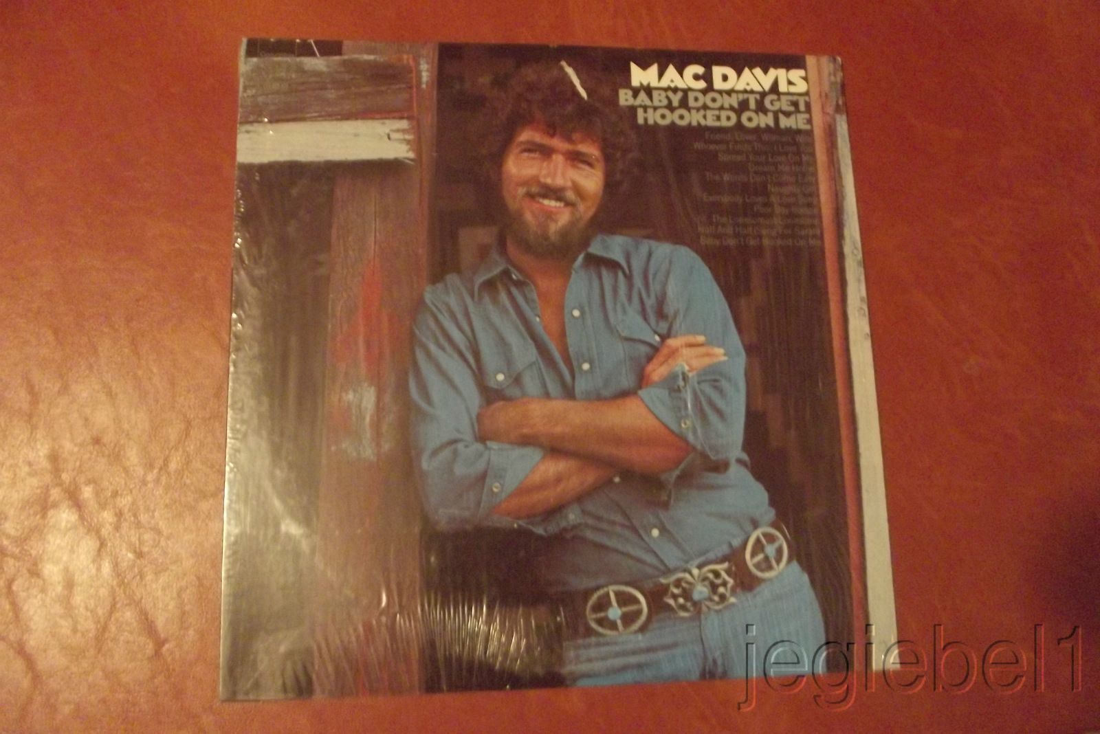 this album is by mac davis baby don t get