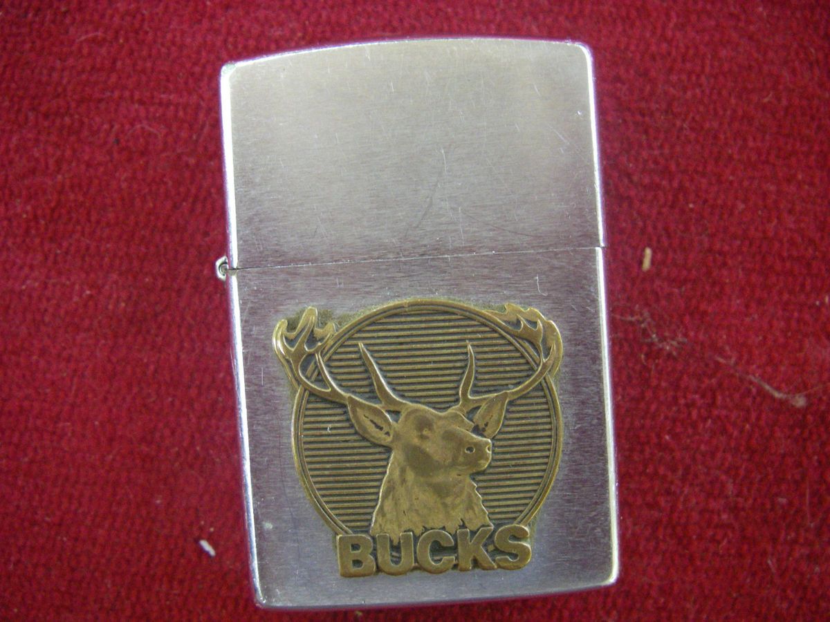 VINTAGE ZIPPO CIGARETTE LIGHTER WITH BRASS BUCKS EMBLEM MONOGRAM ON