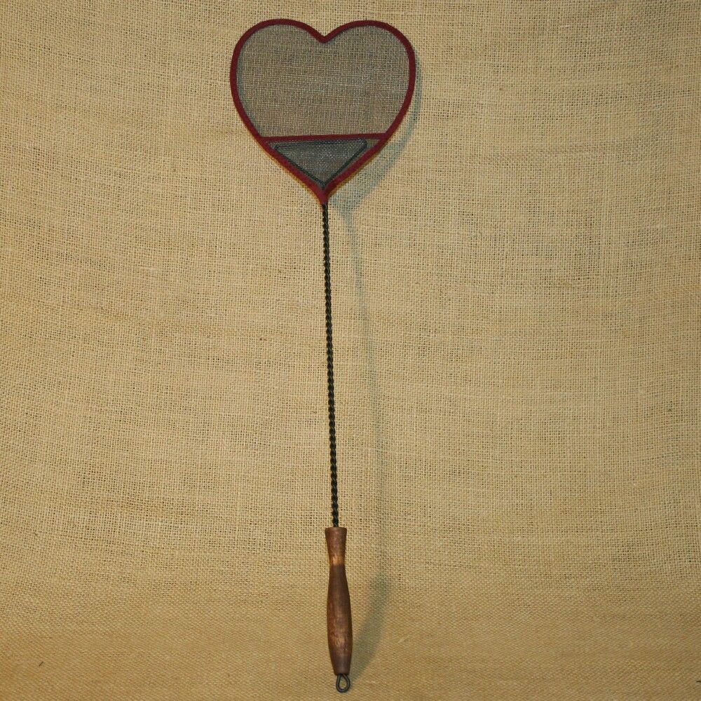 this fly swatter measures 23 3 4 inches long the heart measures 7