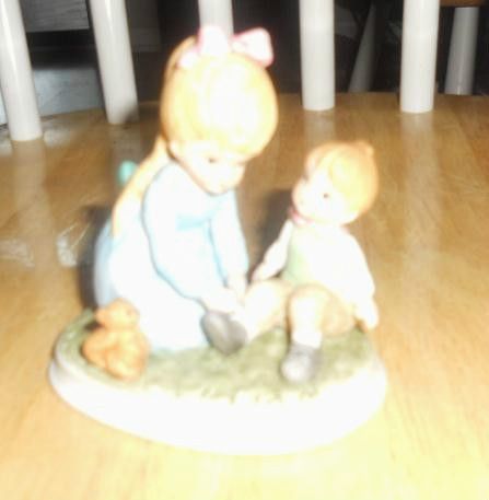 Lefton 06015 Figurine Girl Tying Little Boys Shoe