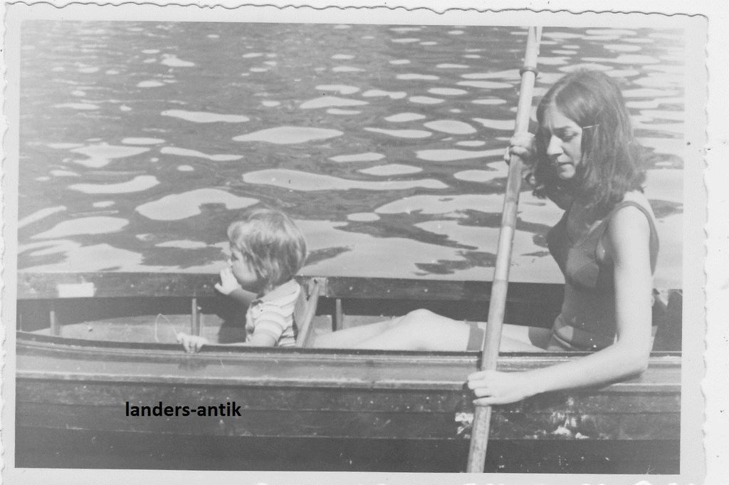 real vinatge photo,young woman and little boy or girl in rowing boat