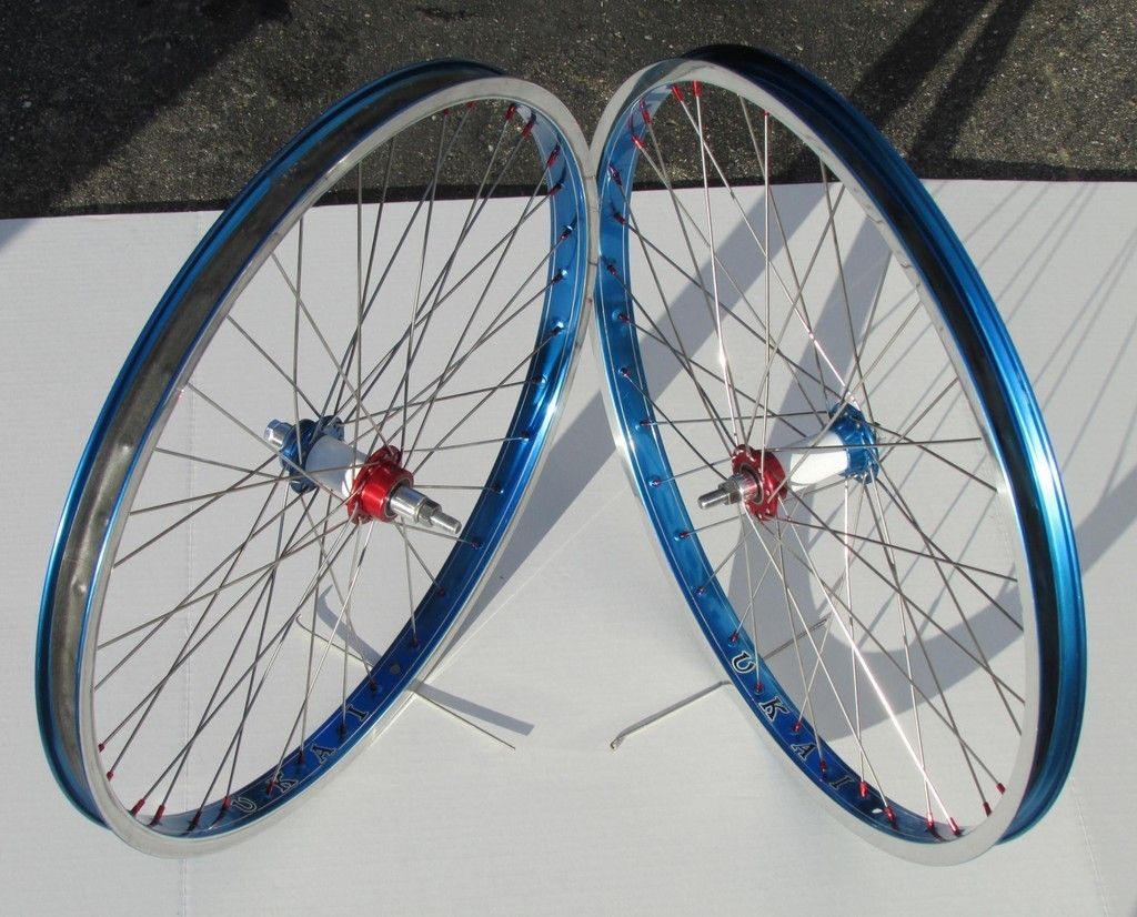  24 WHEELS BLUE ANO RARE BULLSEYE HUB SKYWAY TA CRUISER RIMS NICE