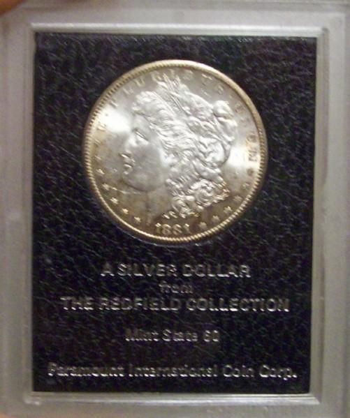 Dollar Paramount Redfield Hoard Collection Rim Toned Coin