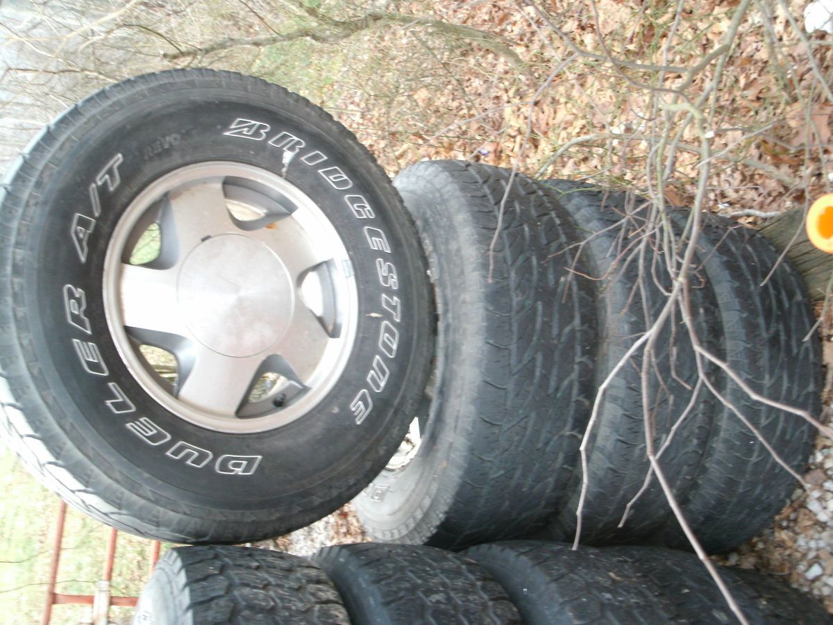 16 x 9 6 LUG CHEVY 4WD OEM 97 TRUCK WHEELS W BRIDGESTONE DUELERS P275